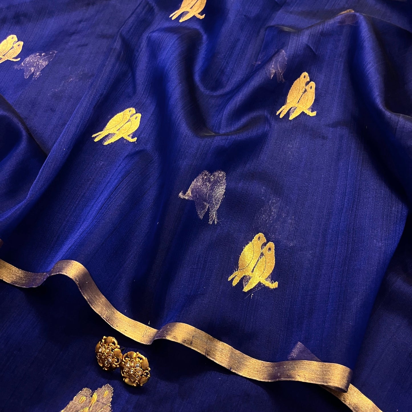 Midnight blue chanderi organza silk saree with bird motifs all over