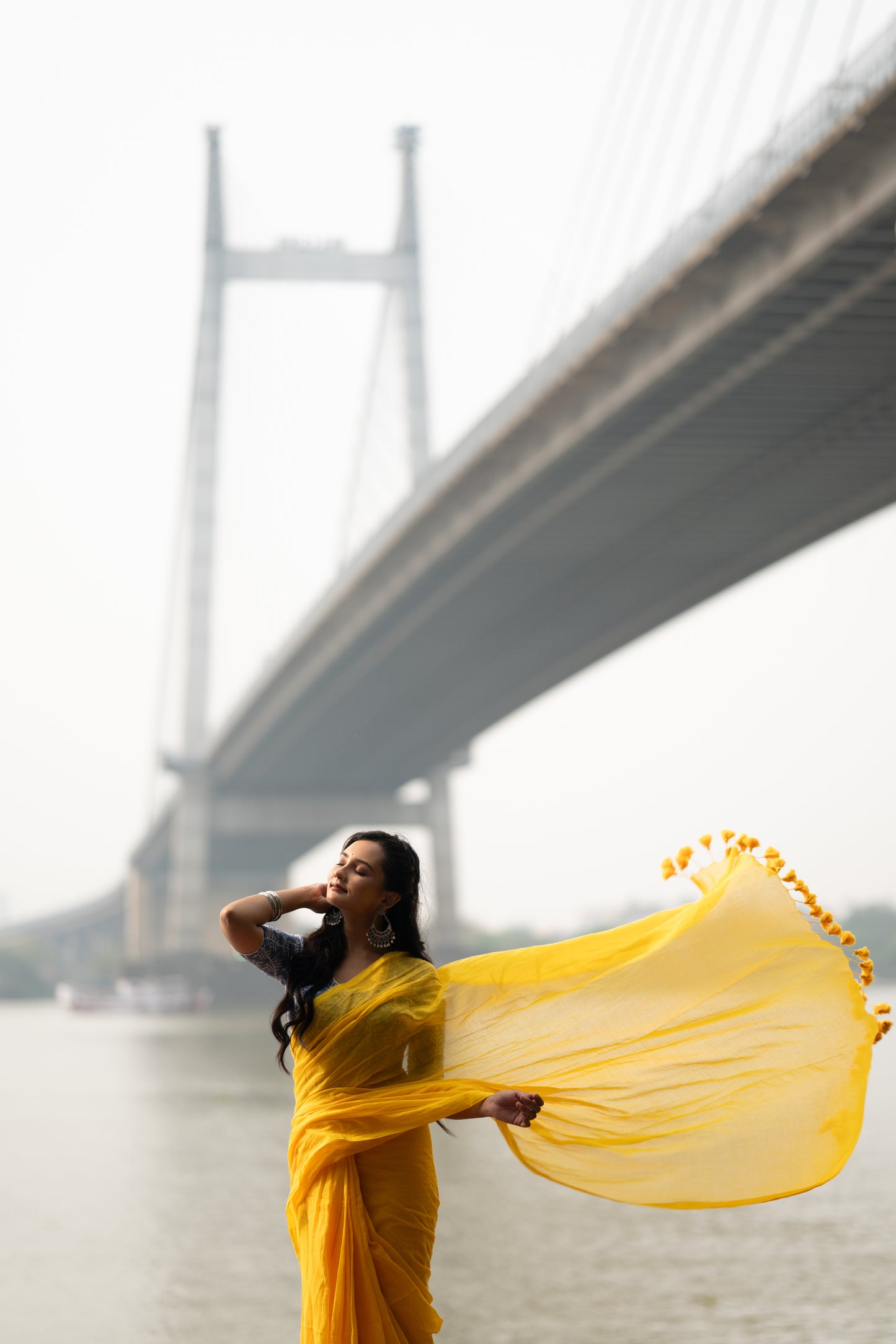 Yellow mulmul saree