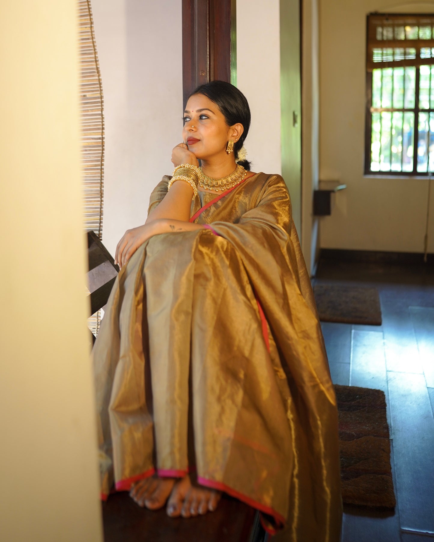 Antique gold & pink maheshwari tissue silk saree with zari lines on pallu