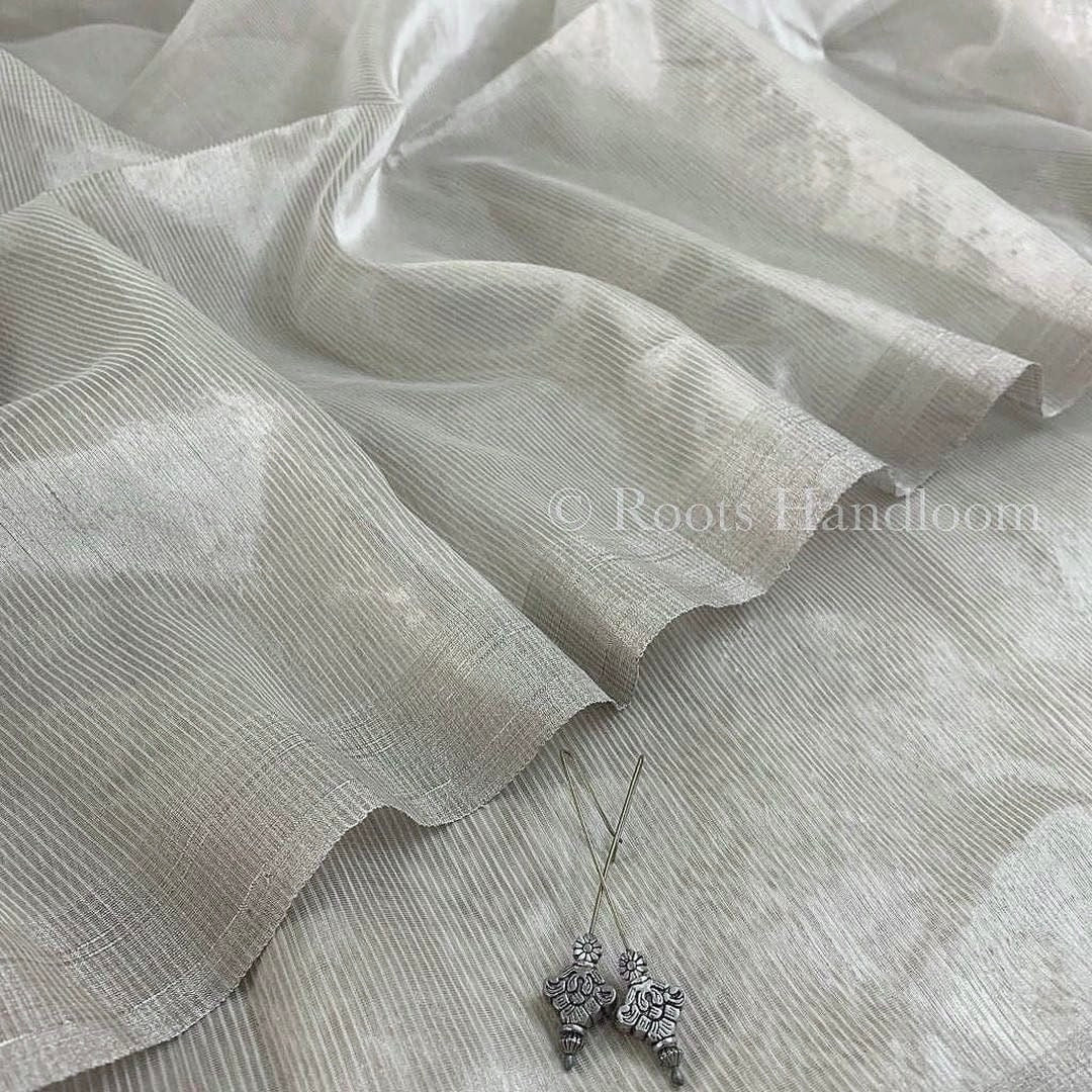 Silver grey Maheshwari saree with zari lines all over