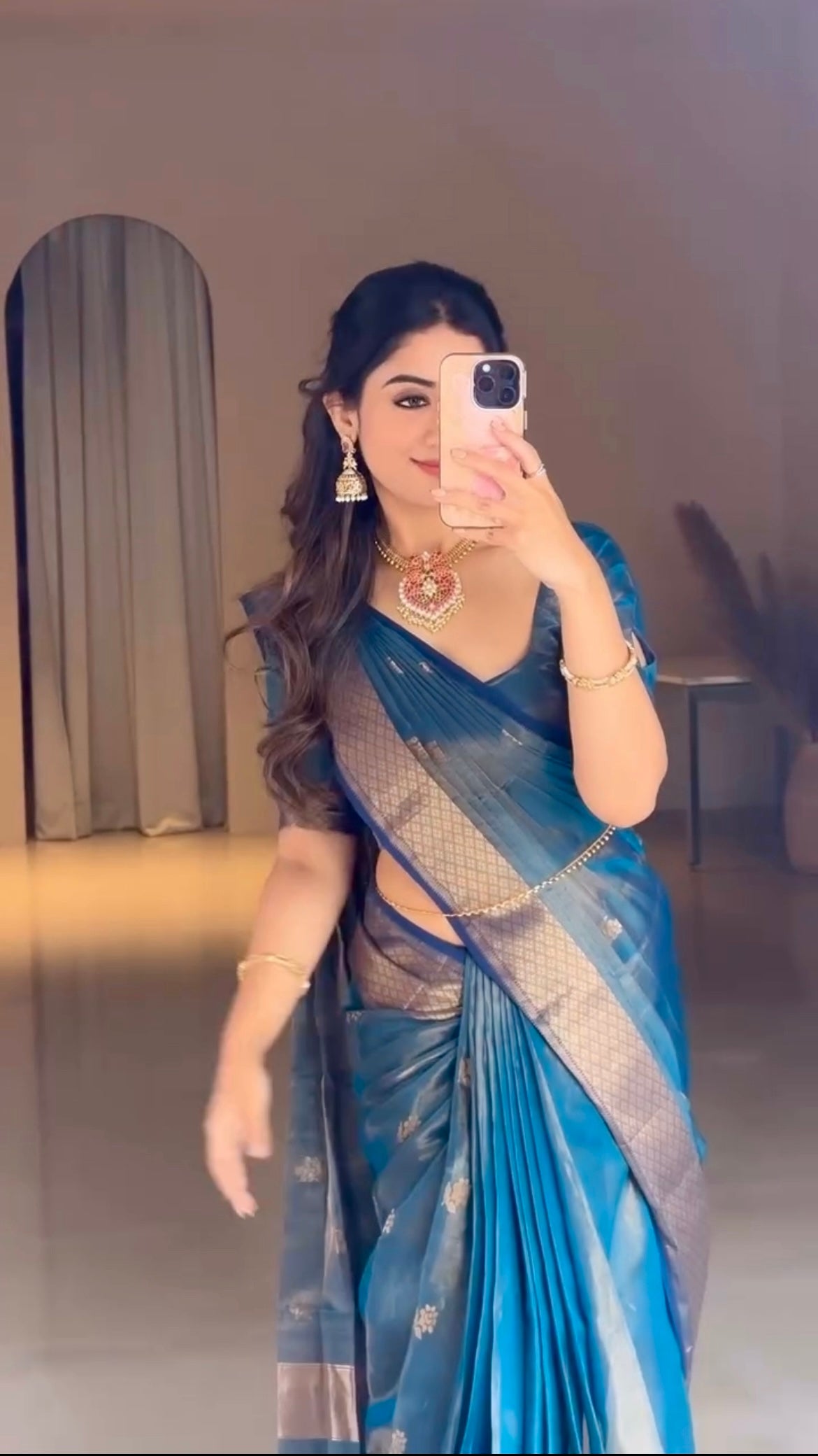 Peacock blue maheshwari tissue silk saree with flower motifs all over