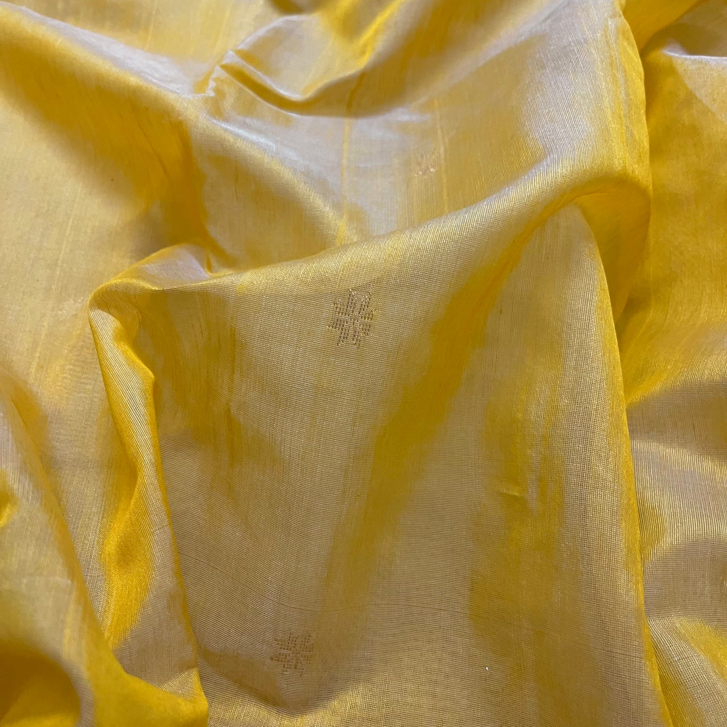 Mustard yellow Chanderi saree with zari bootis all over and flower motifs on pallu