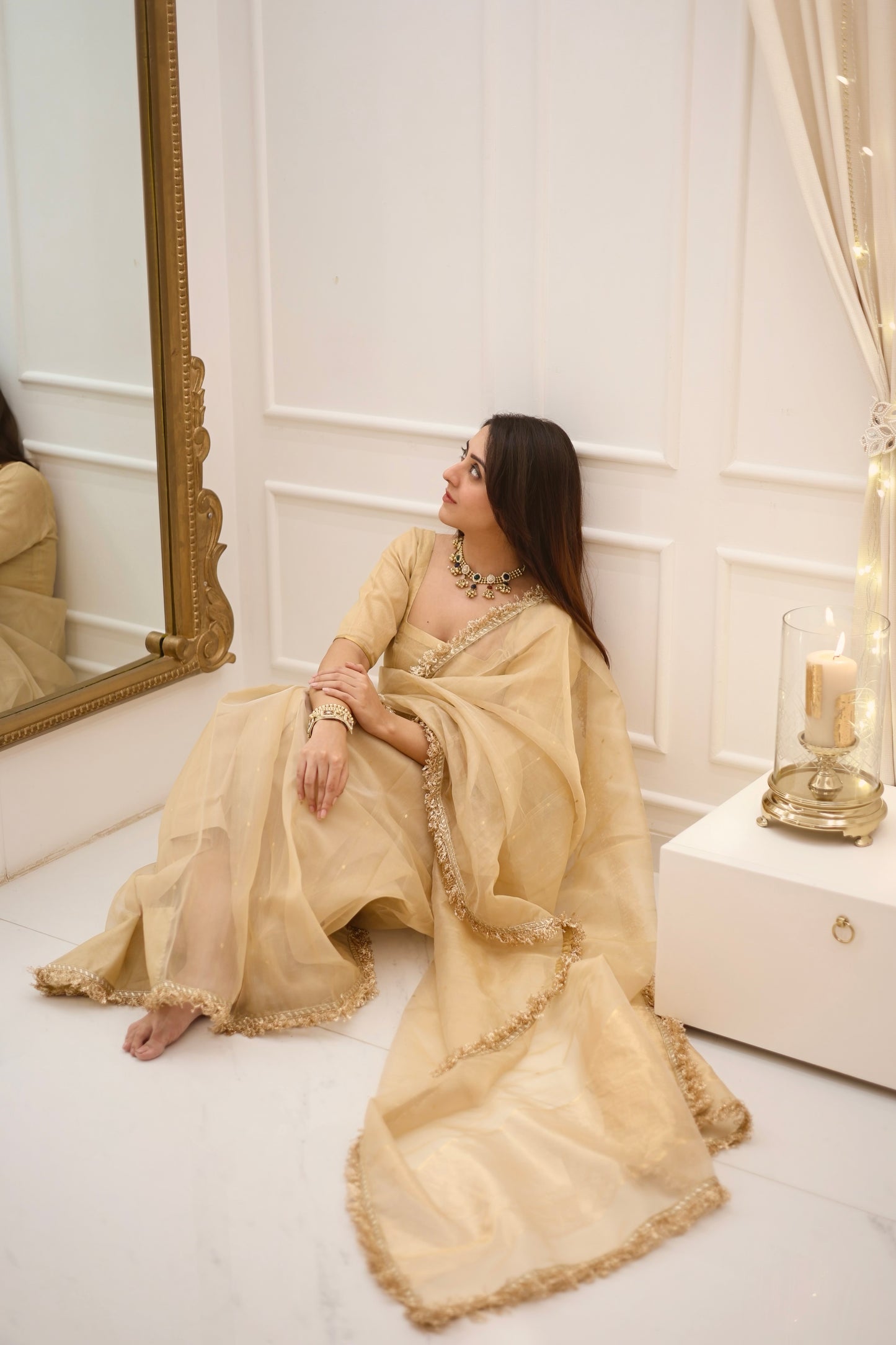 Beige gold Chanderi organza silk saree with zari bootis all over