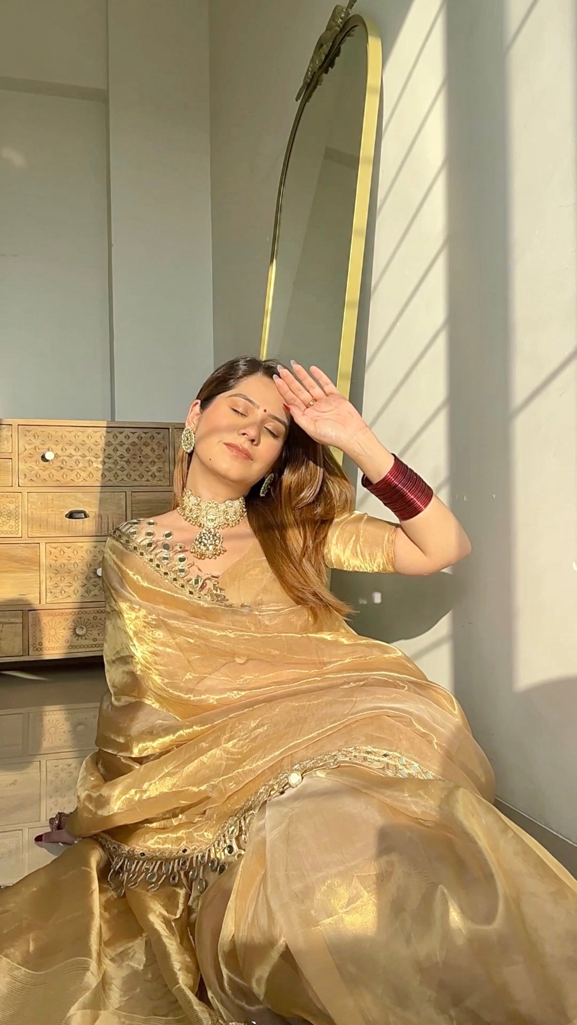 Molten gold chanderi tissue silk saree with dangling mirror work border