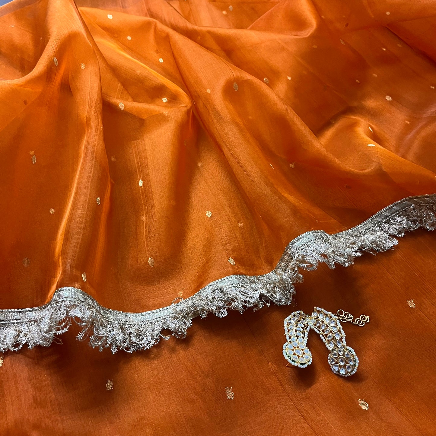 Burnt Orange Chanderi silk saree with zari bootis all over