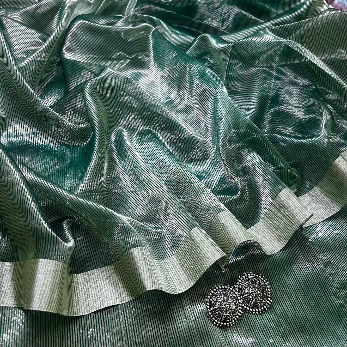 Dark green Maheshwari saree with silver zari lines all over