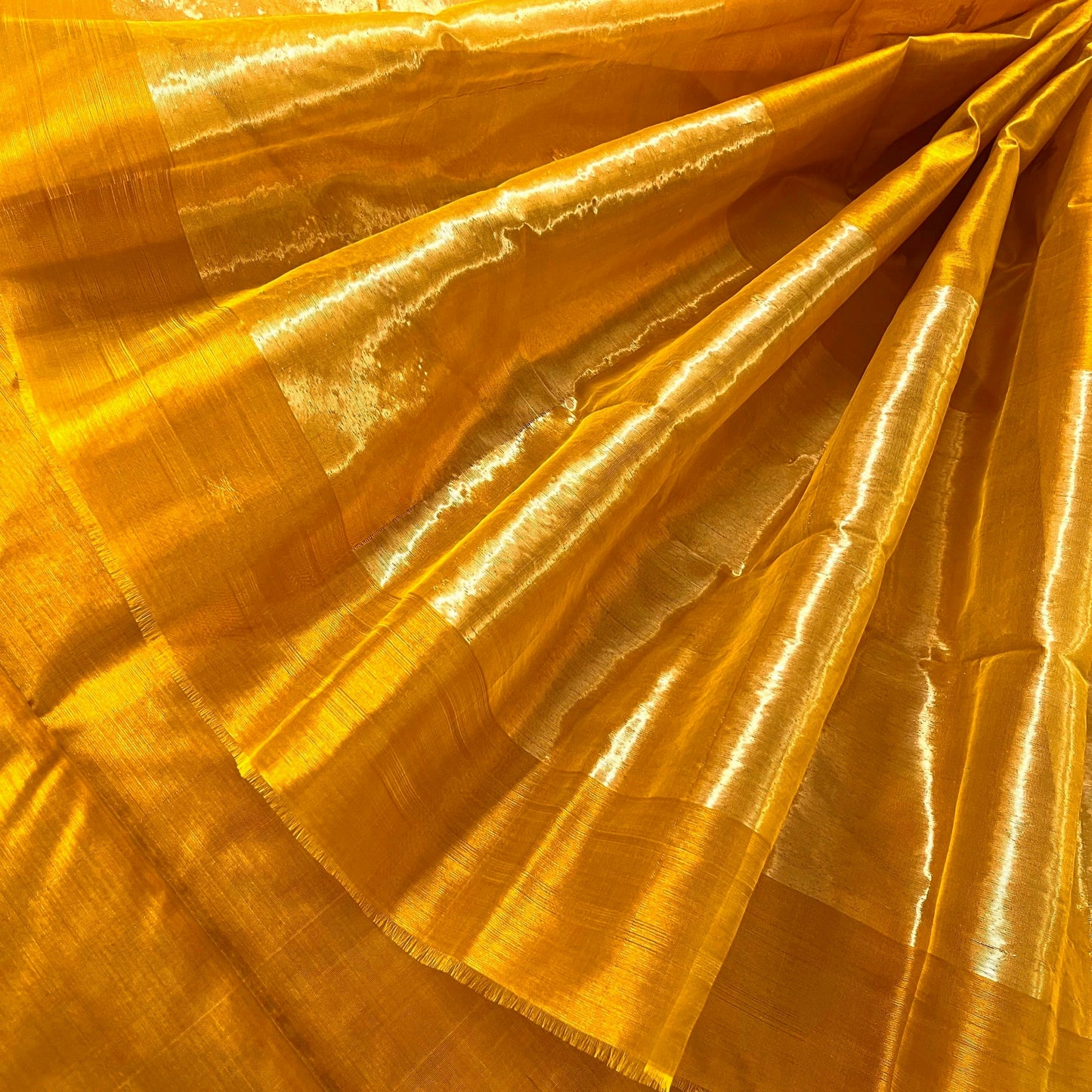 Mustard gold chanderi silk saree with flower bootis all over