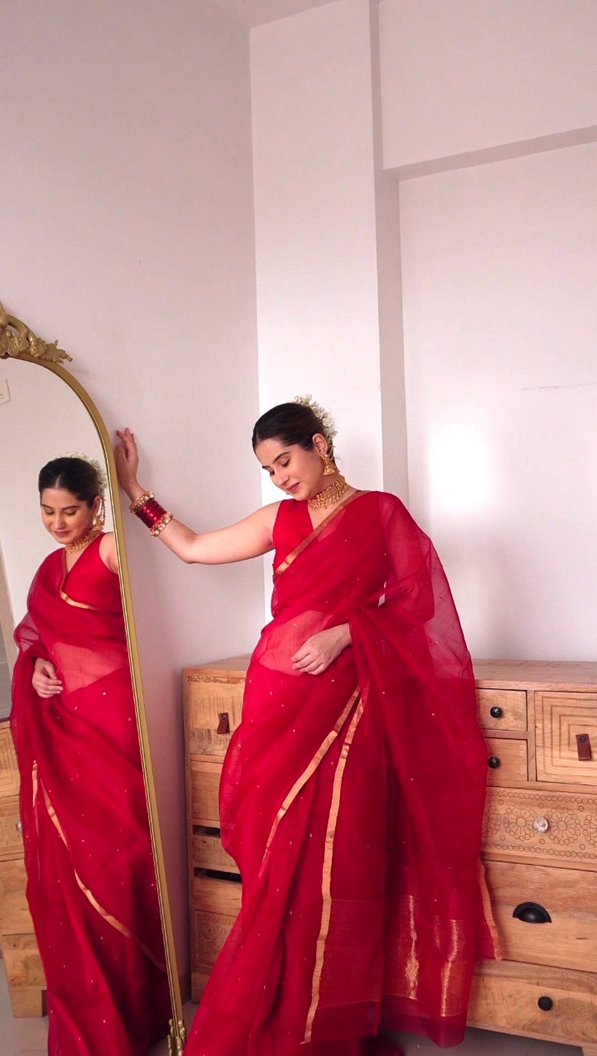 Deep red chanderi organza silk saree with zari bootis all over