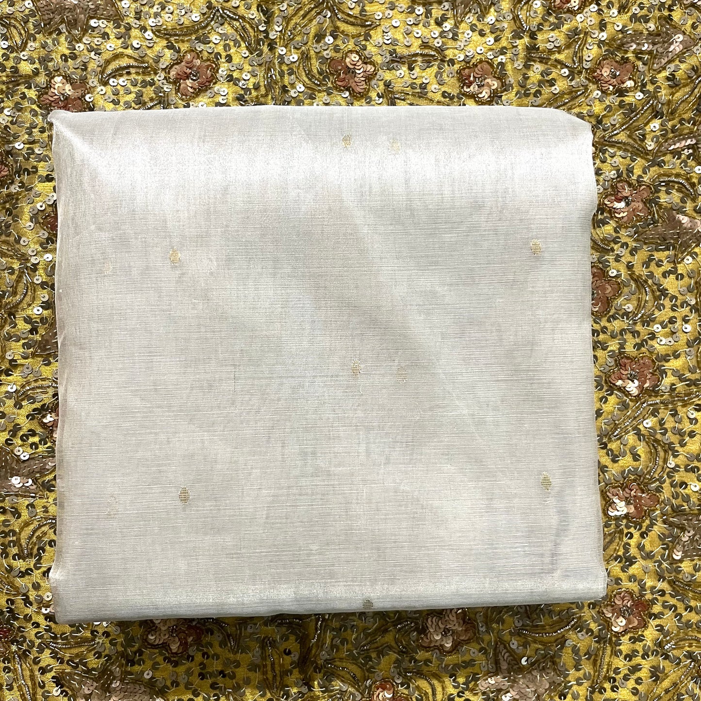 Off white and red Chanderi tissue silk saree with zari bootis all over