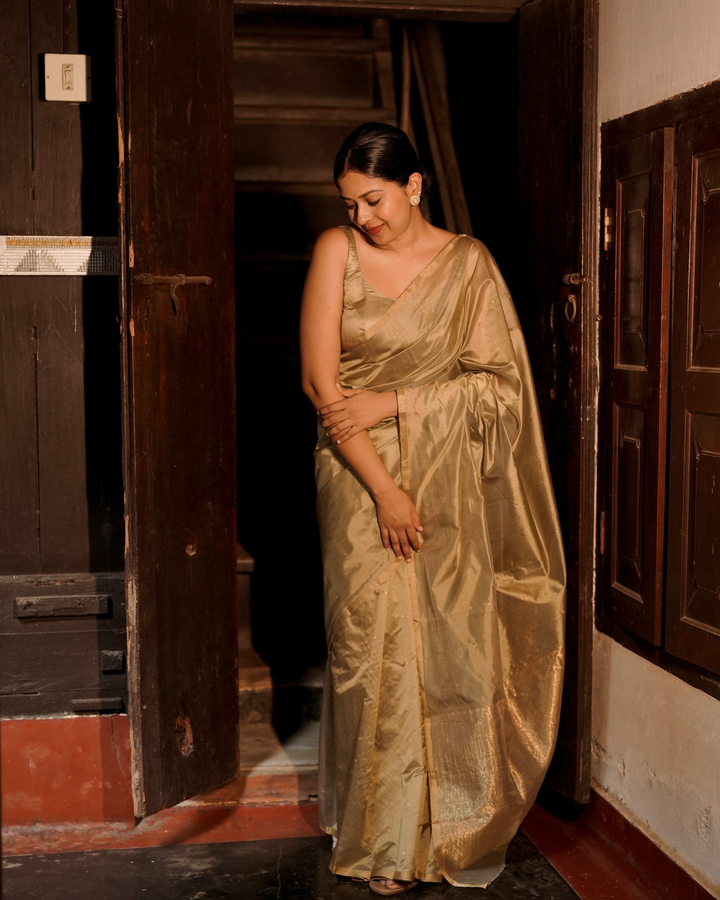 Antique gold chanderi silk saree with zari bootis all over