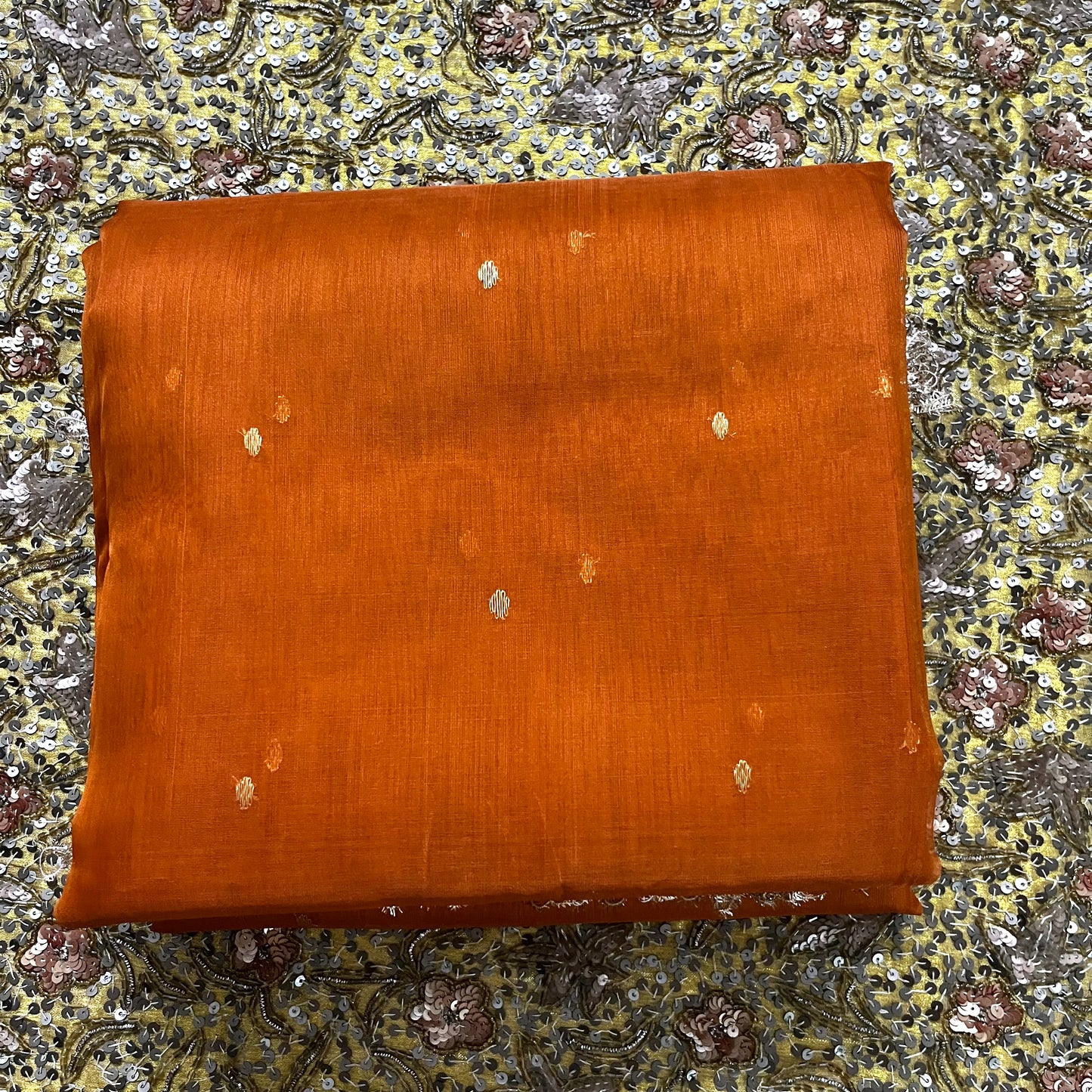 Burnt Orange Chanderi silk saree with zari bootis all over
