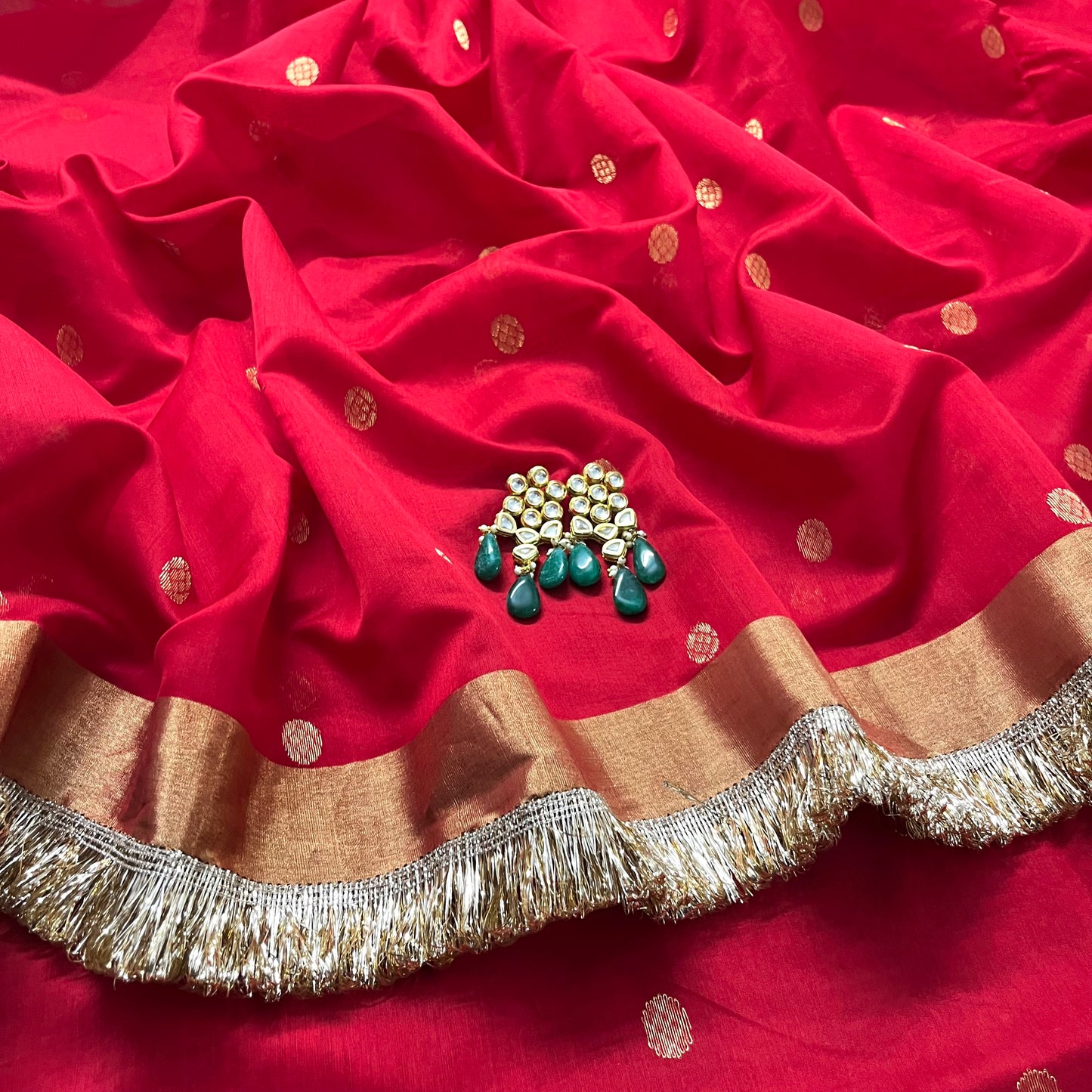 Red Chanderi saree with zari bootis and zari border all over
