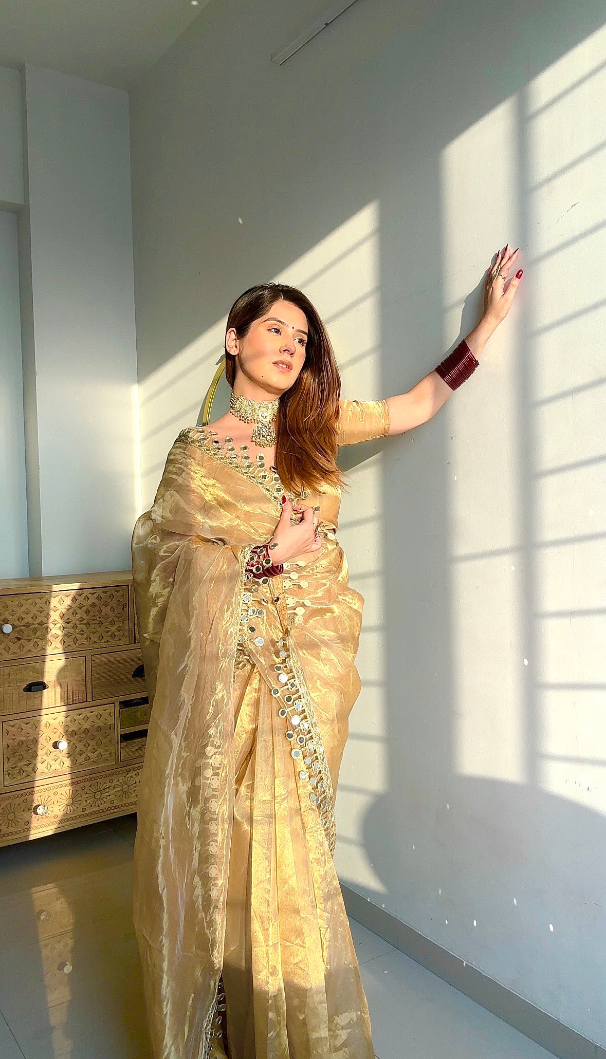 Molten gold chanderi tissue silk saree with dangling mirror work border