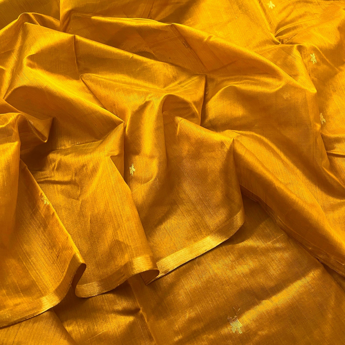 Mustard gold chanderi silk saree with flower bootis all over