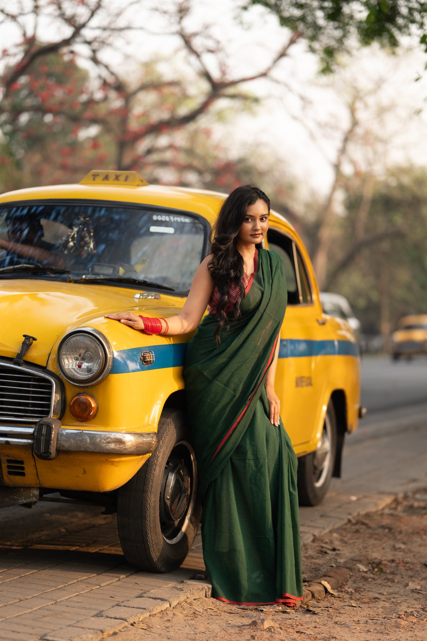 Dark green and red mulmul saree