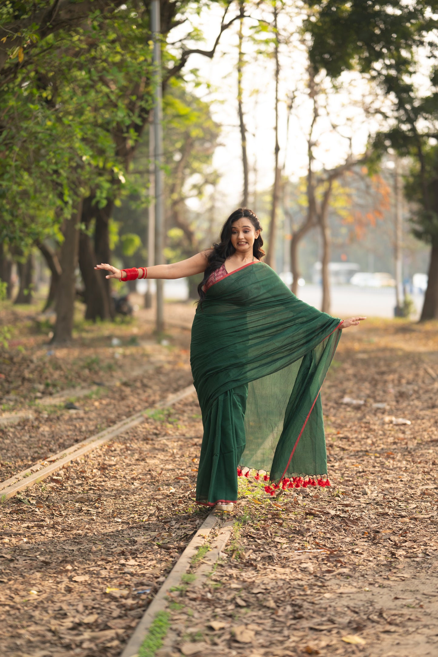 Dark green and red mulmul saree