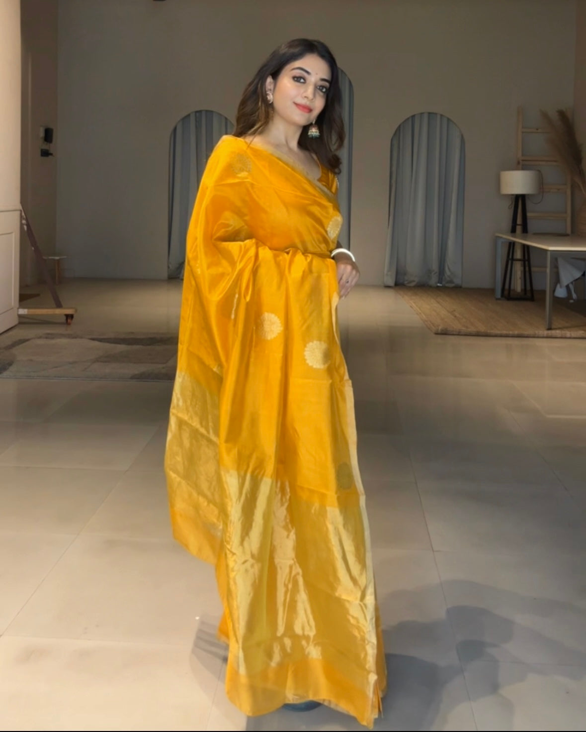Yellow chanderi silk saree with mor motifs all over