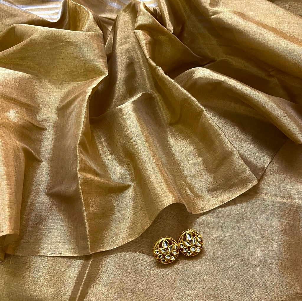 Gold and silver chanderi tissue silk saree with zari stripes all over