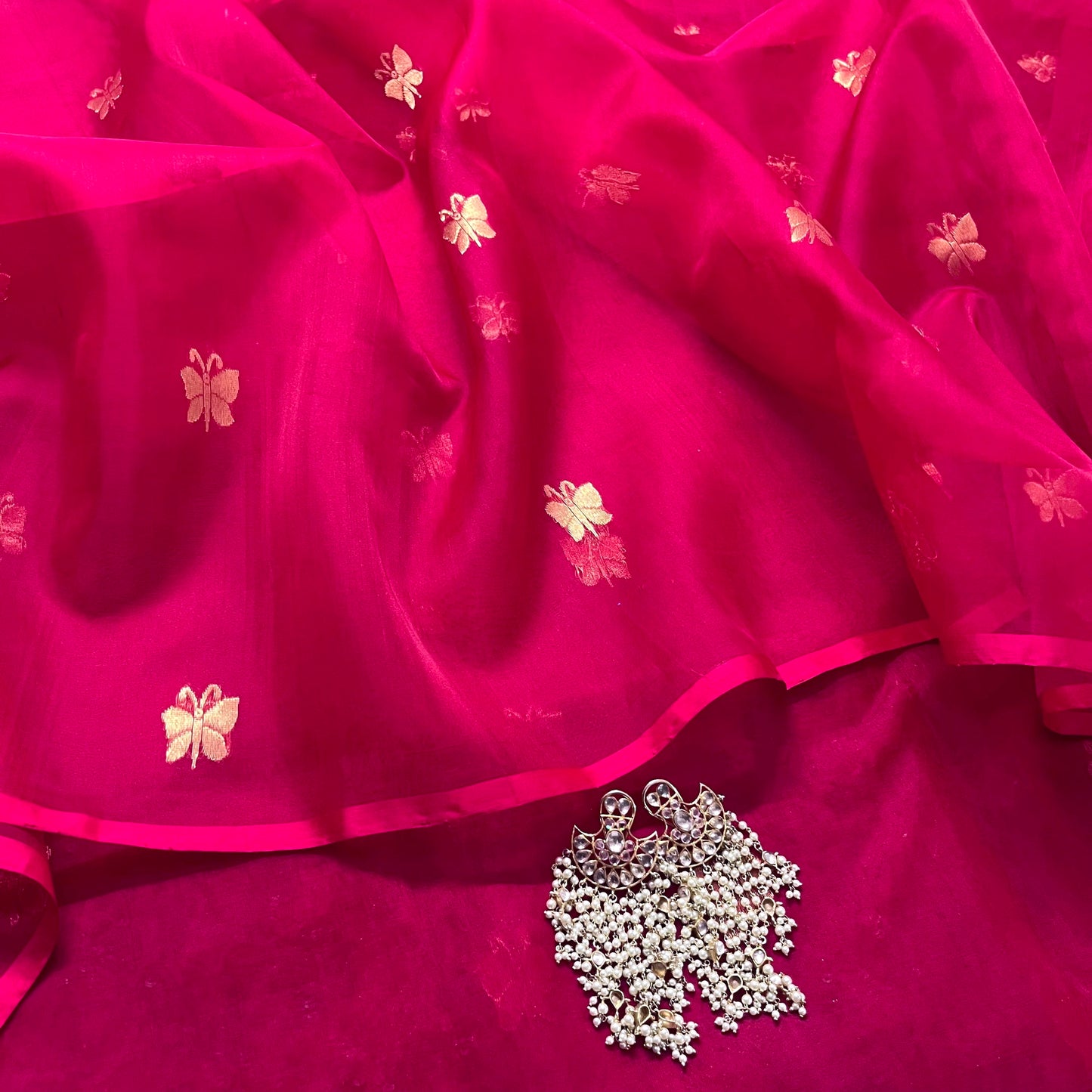 Rani pink Chanderi silk saree with butterfly motifs all over