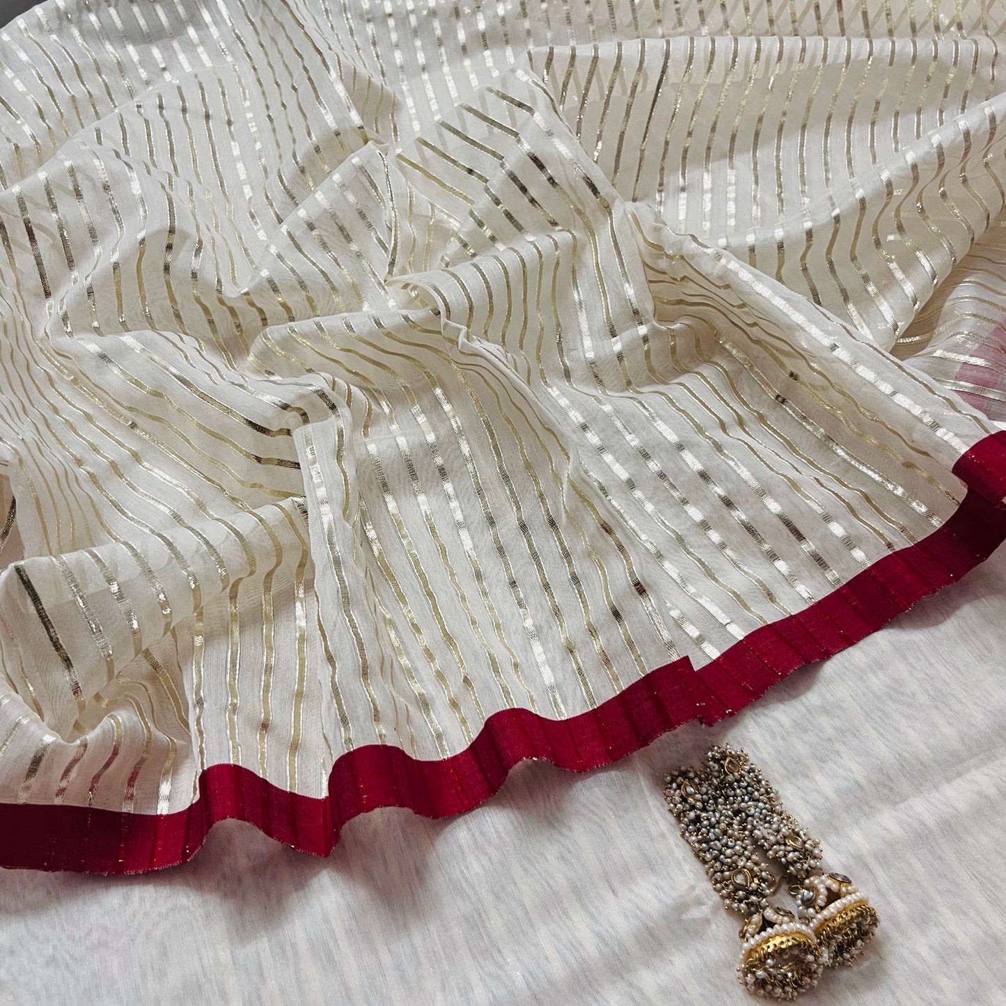 Off white & red chanderi saree with intricate gota work all over