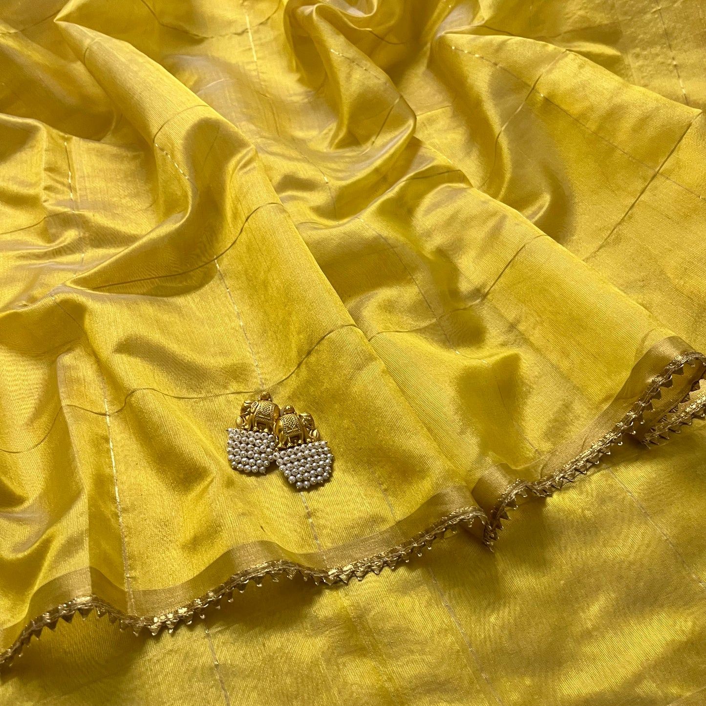 Butter yellow Chanderi silk saree with zari checks all over