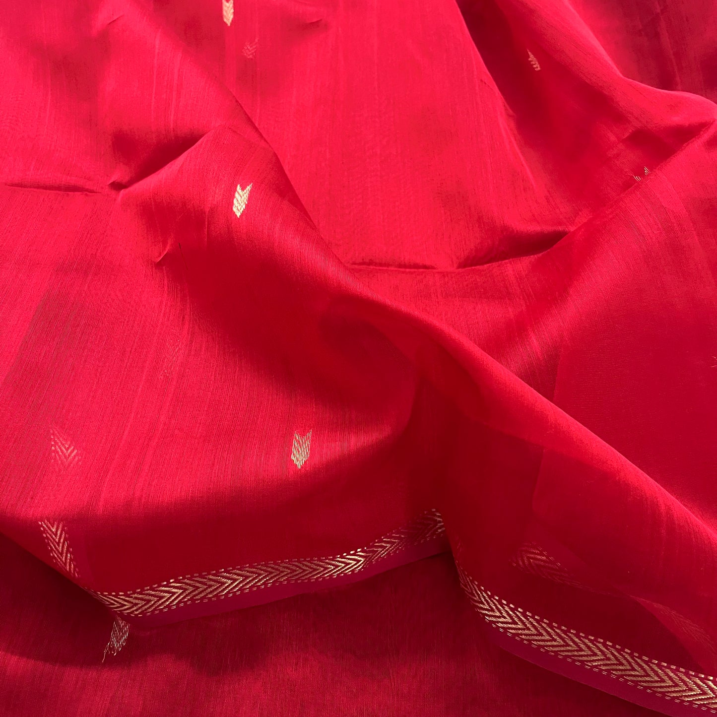 Red maheshwari saree with zari border & zari bootis all over