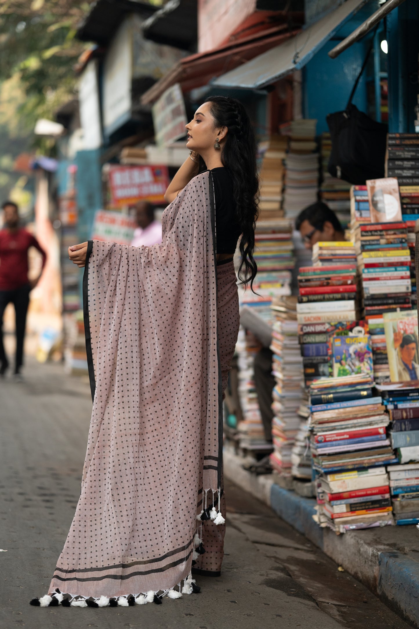 Greyish beige and black polka dot mulmul saree