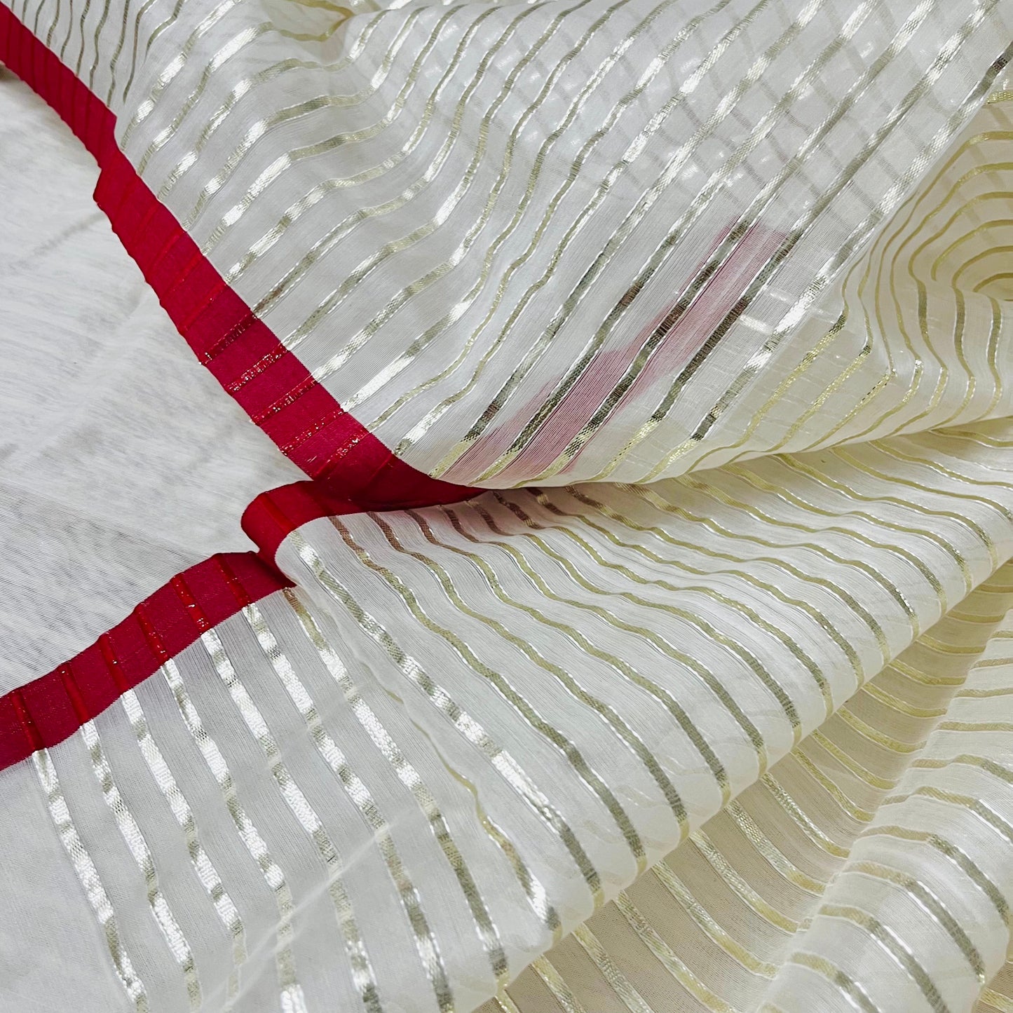 Off white & red chanderi saree with intricate gota work all over