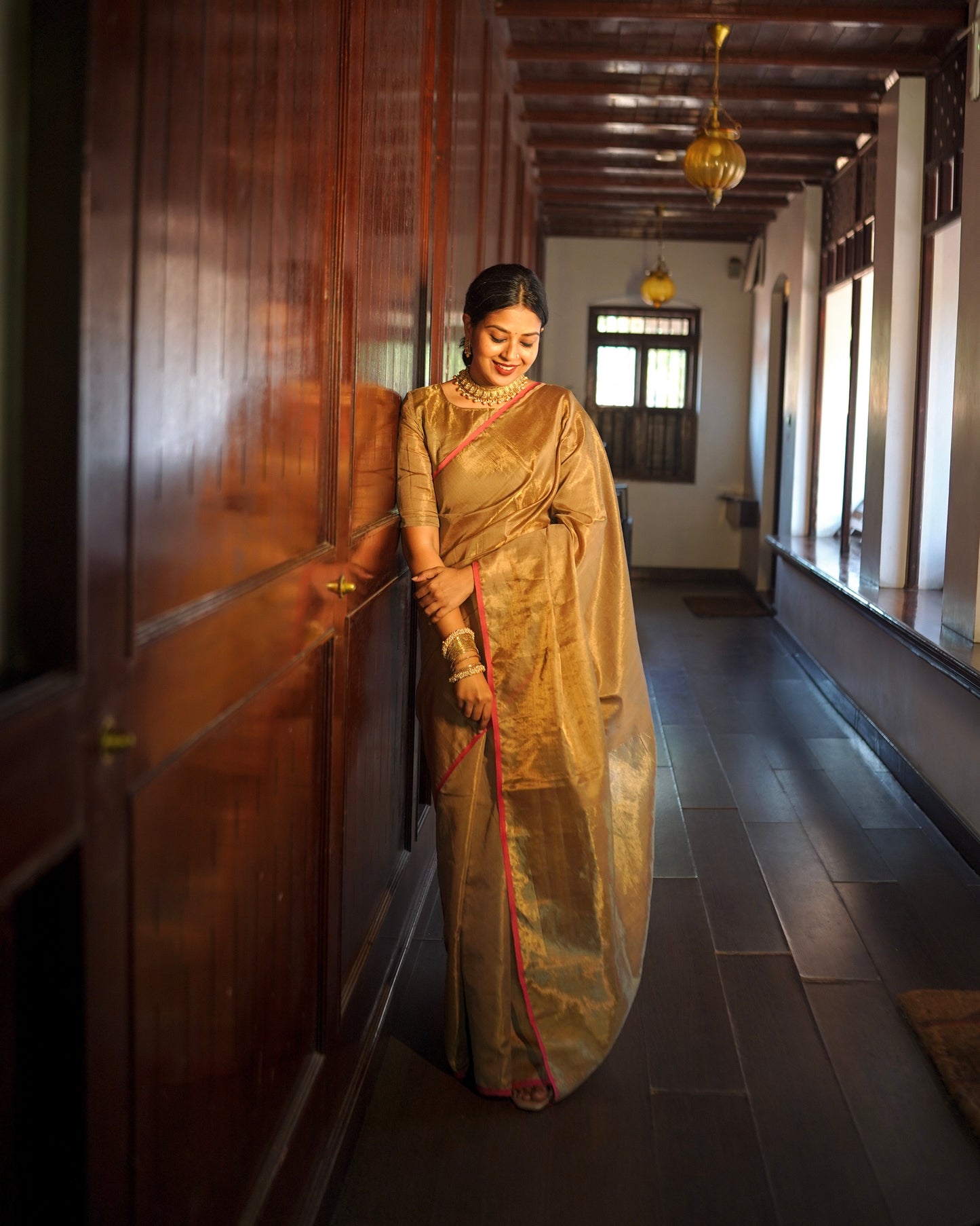 Antique gold & pink maheshwari tissue silk saree with zari lines on pallu
