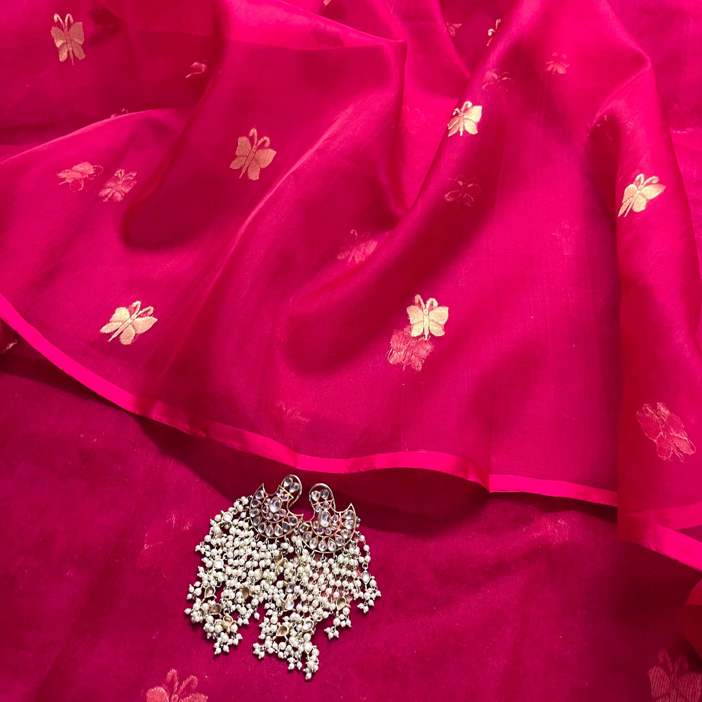 Rani pink Chanderi silk saree with butterfly motifs all over