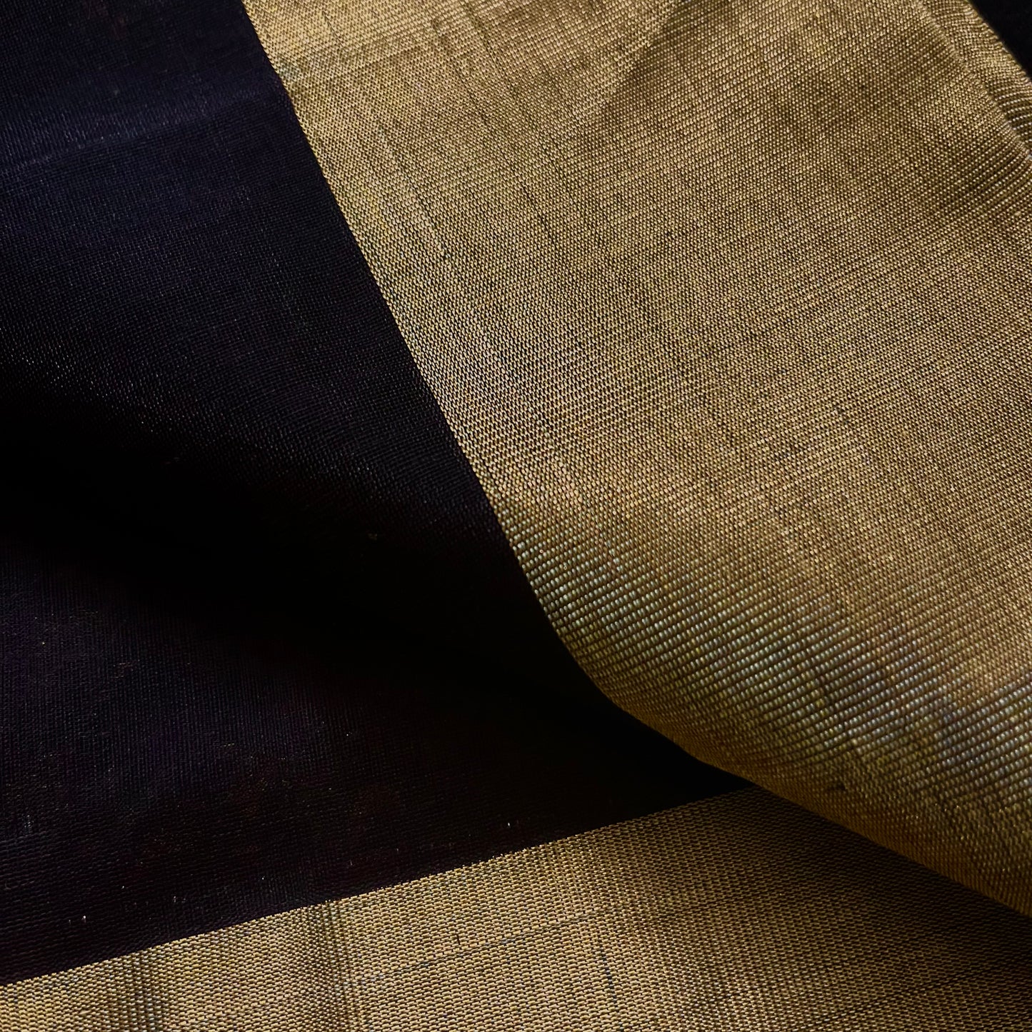 Black Chanderi saree with zari bootis all over and flower motifs on pallu