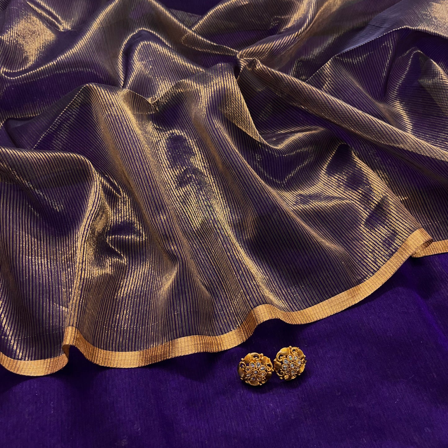 Dark purple and gold maheshwari saree with zari border