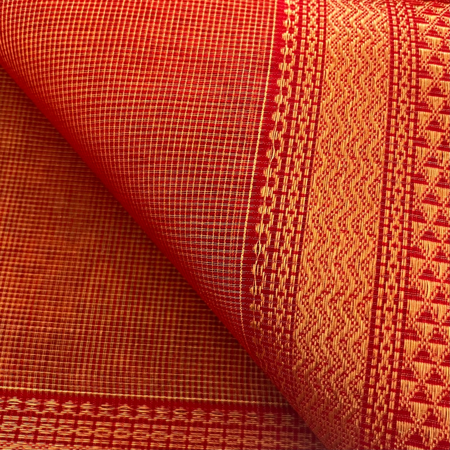 Red and gold Maheshwari silk saree with zari jaal work on pallu