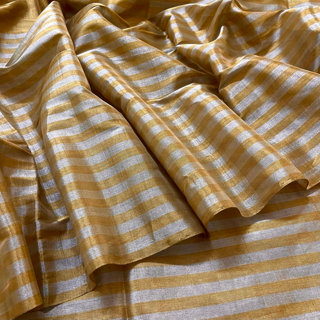 Gold and silver chanderi tissue silk saree with zari stripes all over