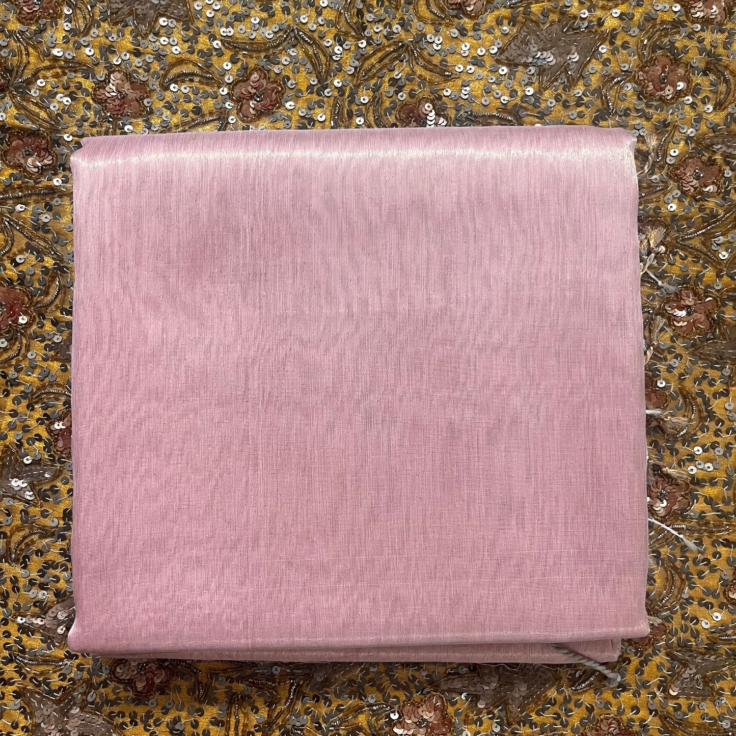 Peachish pink maheshwari tissue silk saree with zari pattern on pallu