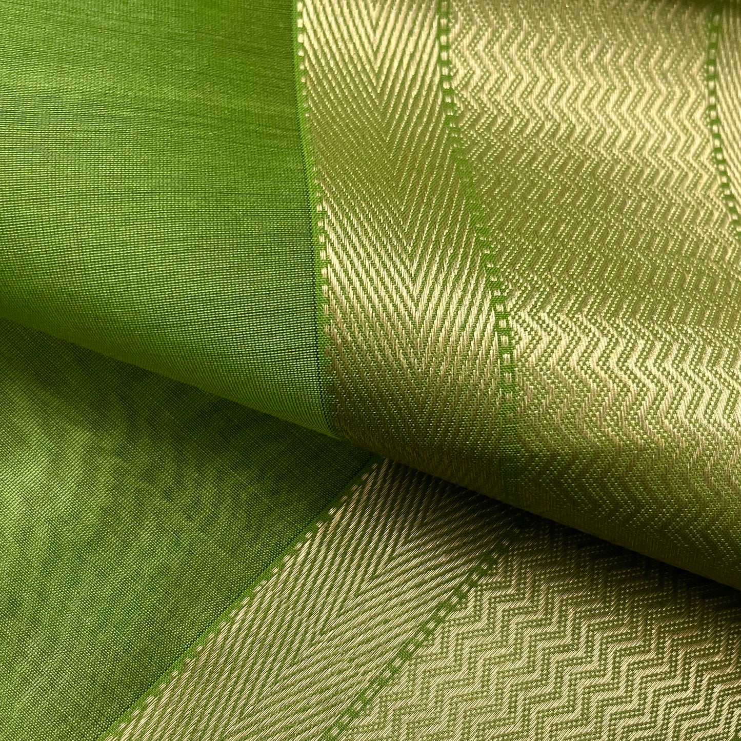 Olive green maheshwari saree with flower motifs all over