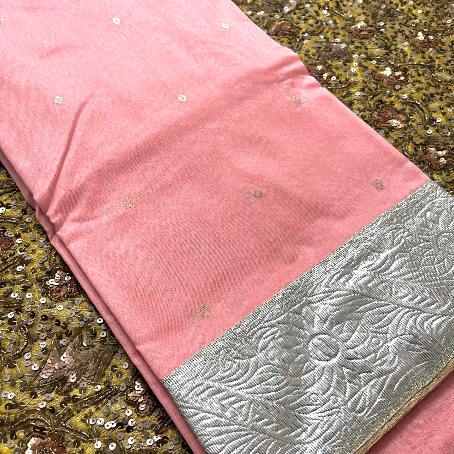Peachish pink chanderi saree with zari bootis all over