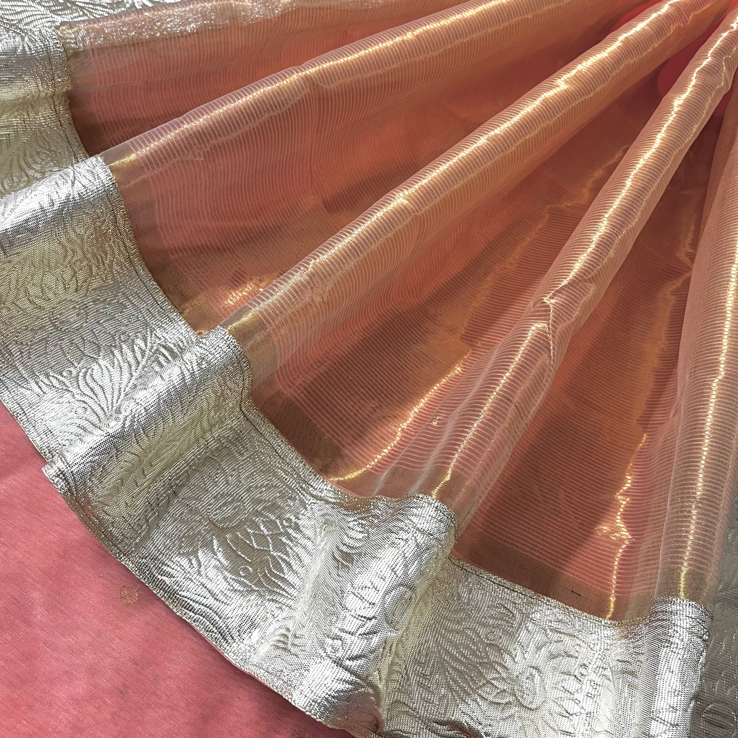 Peachish pink chanderi saree with zari bootis all over