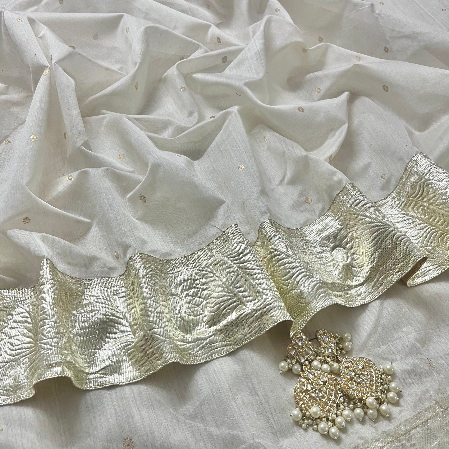 Off white Chanderi saree with zari bootis all over