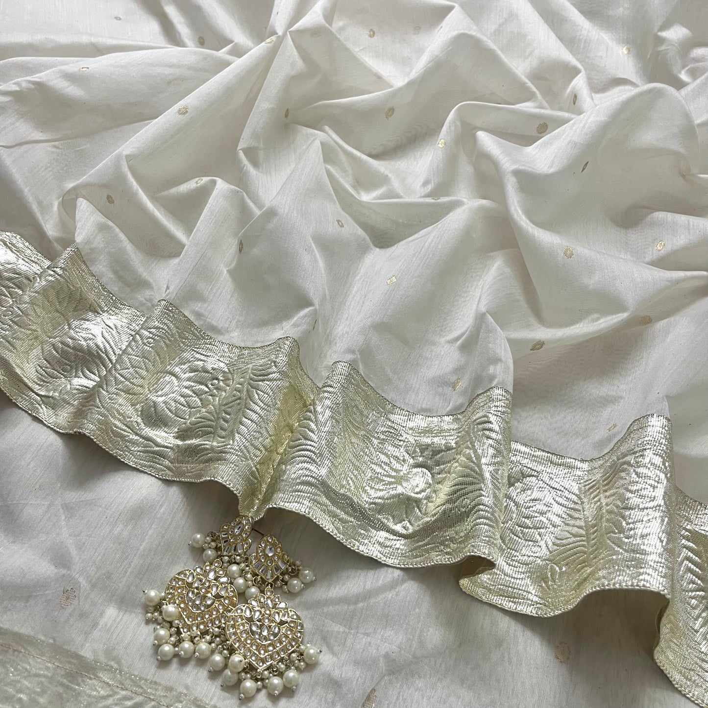 Off white Chanderi saree with zari bootis all over
