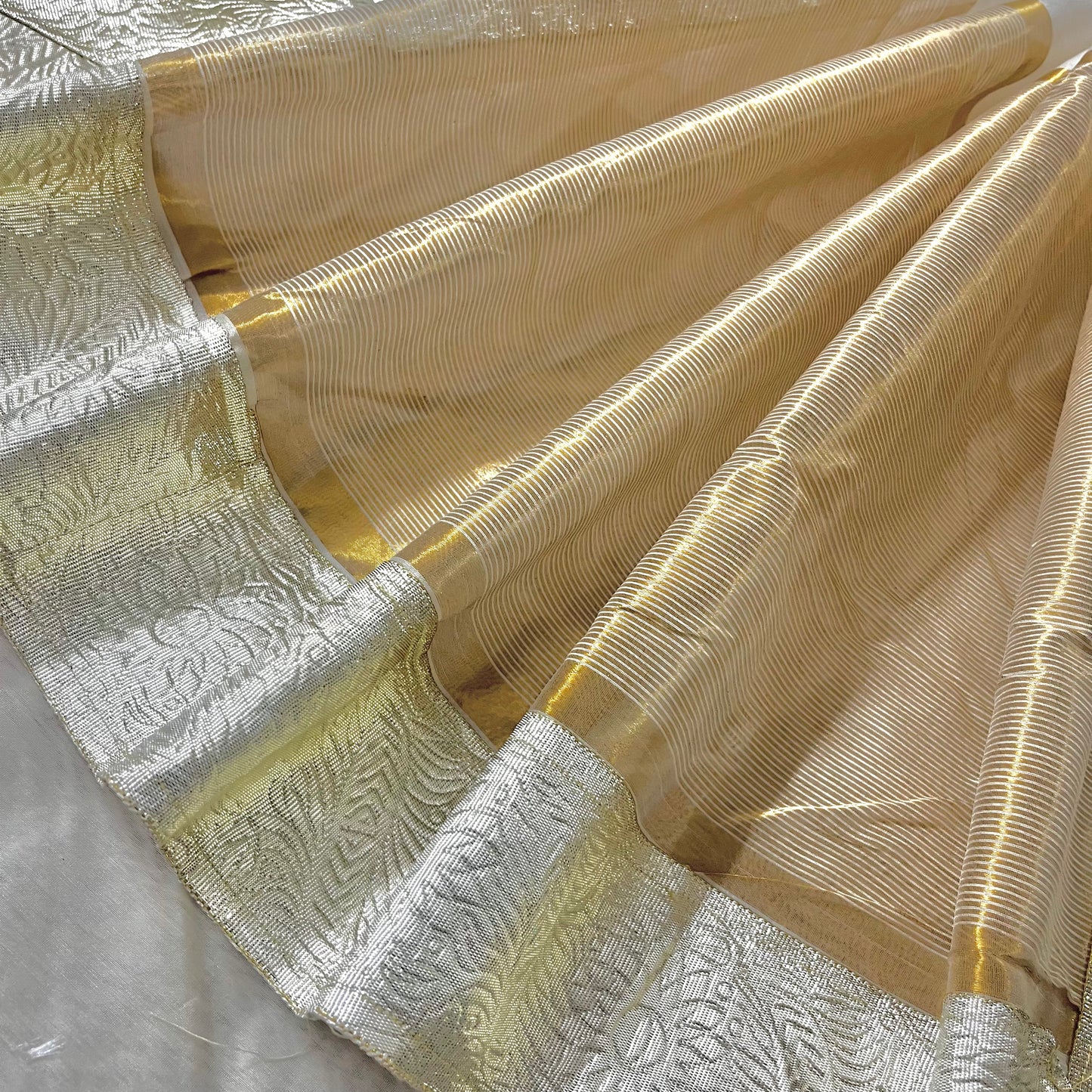 Off white Chanderi saree with zari bootis all over