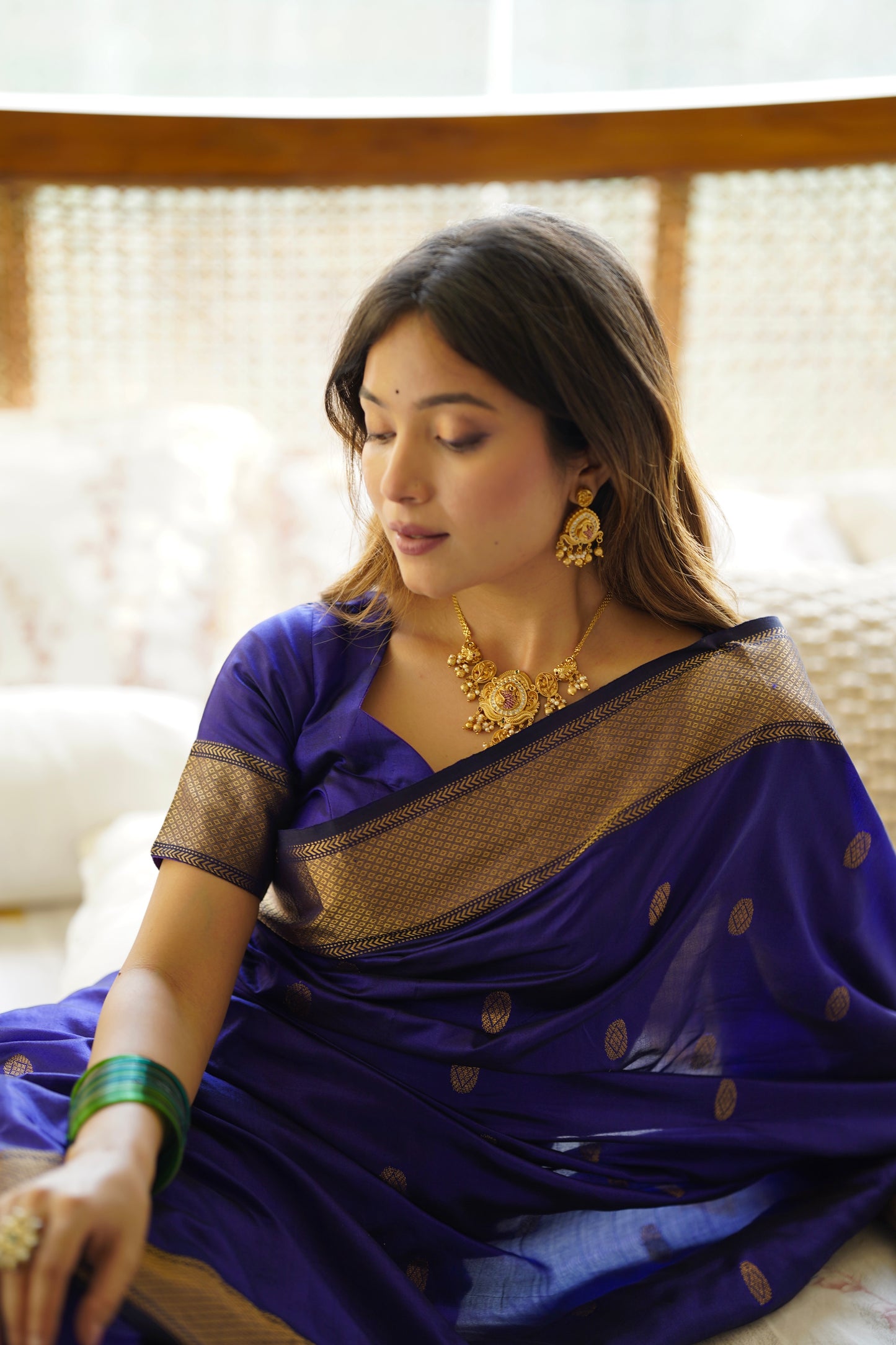 Dark blue maheshwari silk saree with zari bootis all over