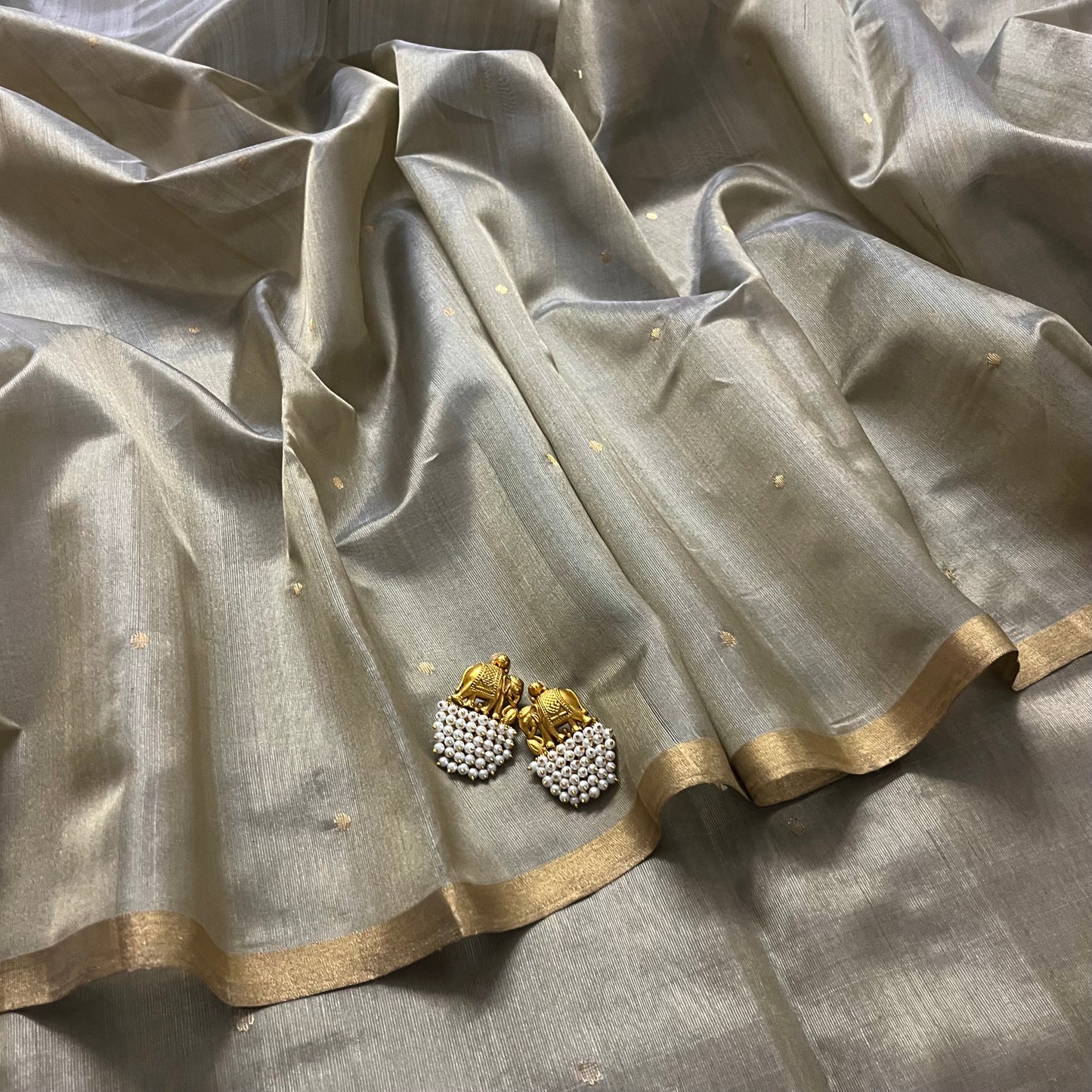 Antique gold chanderi silk saree with zari bootis all over