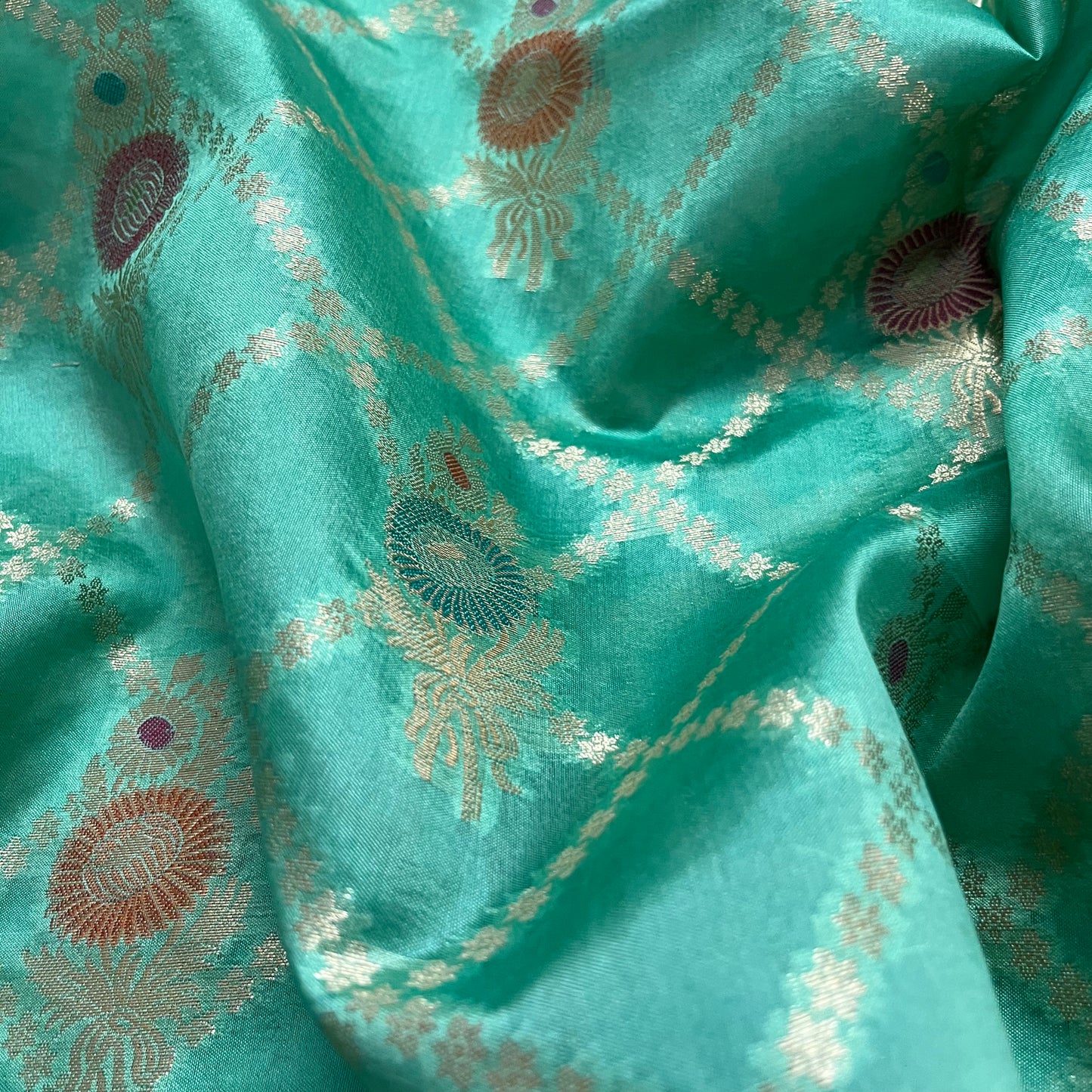 Sea green banarasi silk saree with zari jaal work all over
