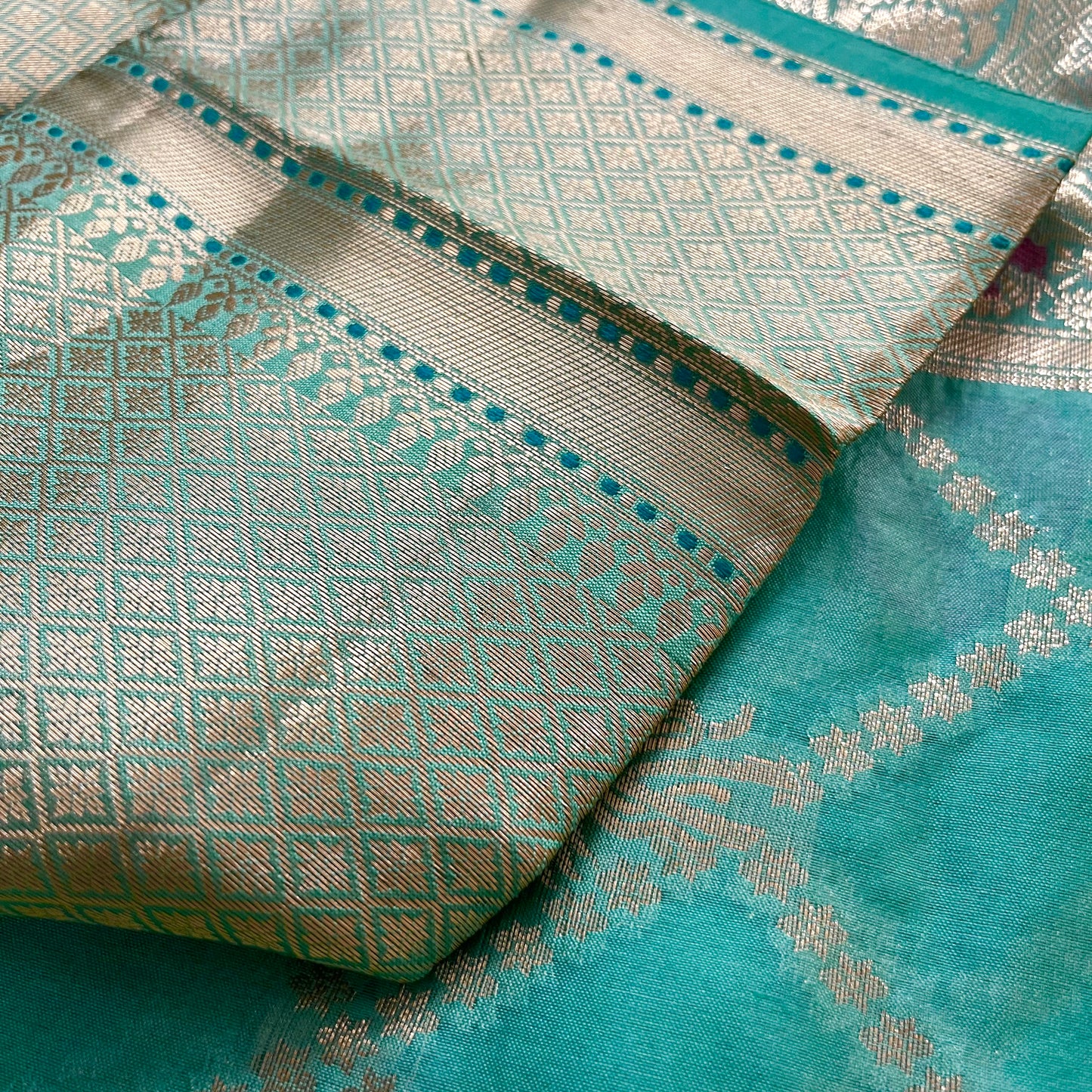 Sea green banarasi silk saree with zari jaal work all over