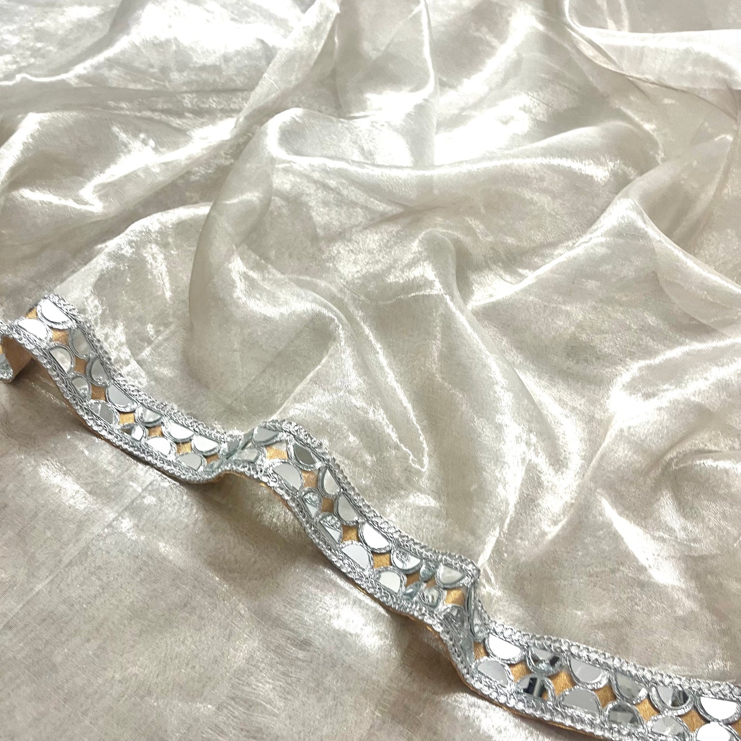 Molten silver and gold chanderi tissue silk saree with mirror work border