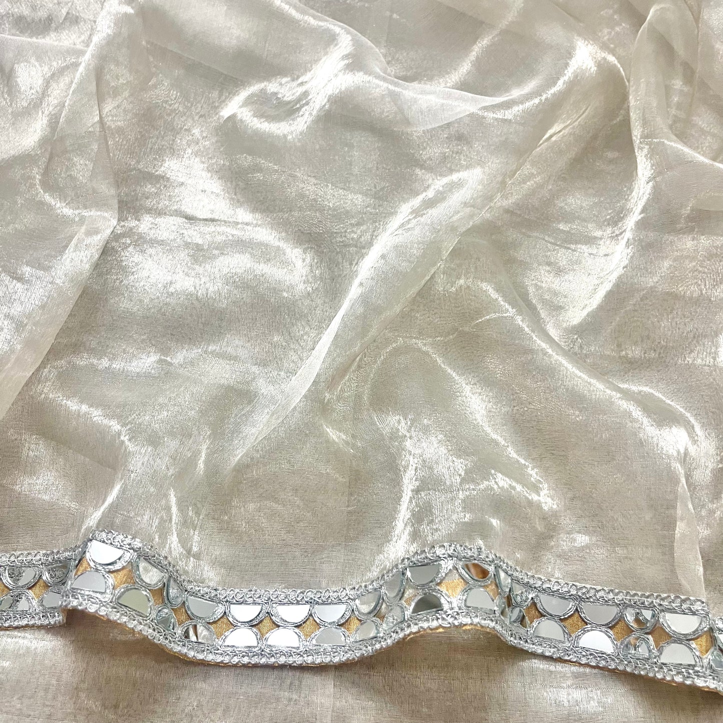 Molten silver and gold chanderi tissue silk saree with mirror work border