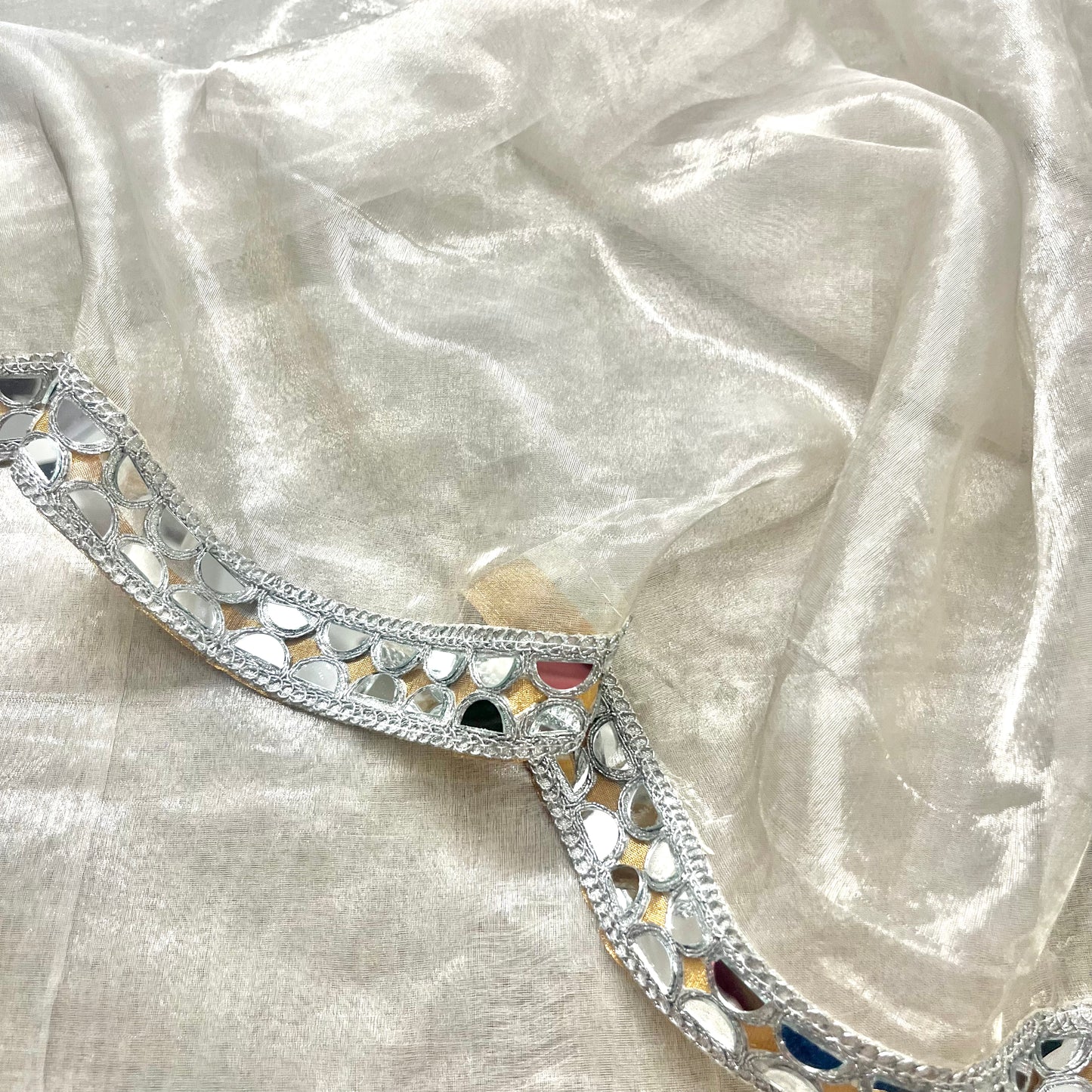 Molten silver and gold chanderi tissue silk saree with mirror work border