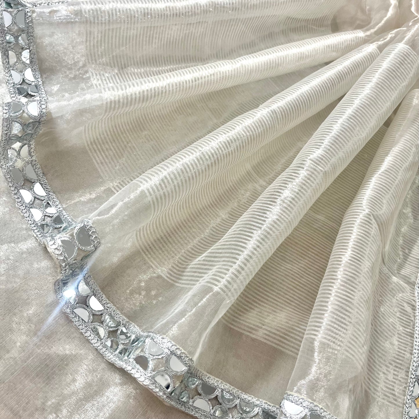 Molten silver and gold chanderi tissue silk saree with mirror work border