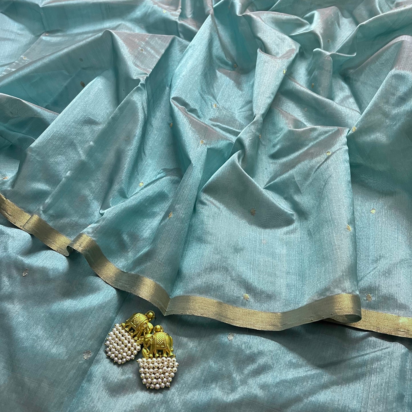 Baby blue chanderi silk saree with zari bootis all over